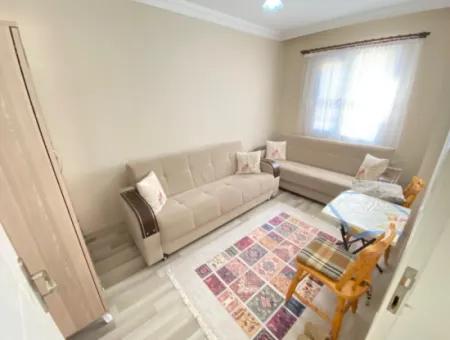 2 1 Apartment With Ground Floor Garden For Sale In Seferihisar Ürkmez Center