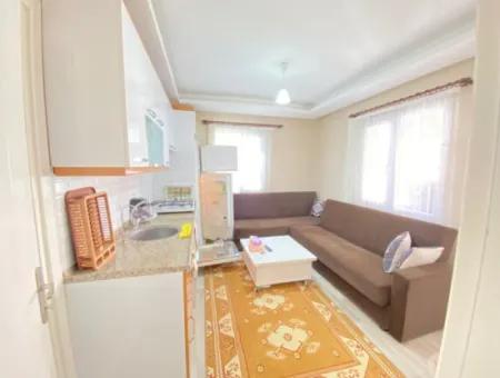 2 1 Apartment With Ground Floor Garden For Sale In Seferihisar Ürkmez Center